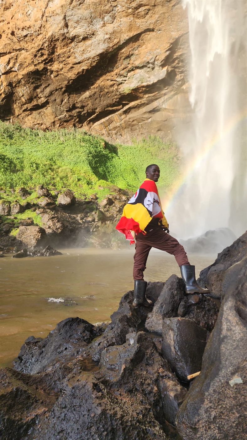Paius near a waterfall and rocks