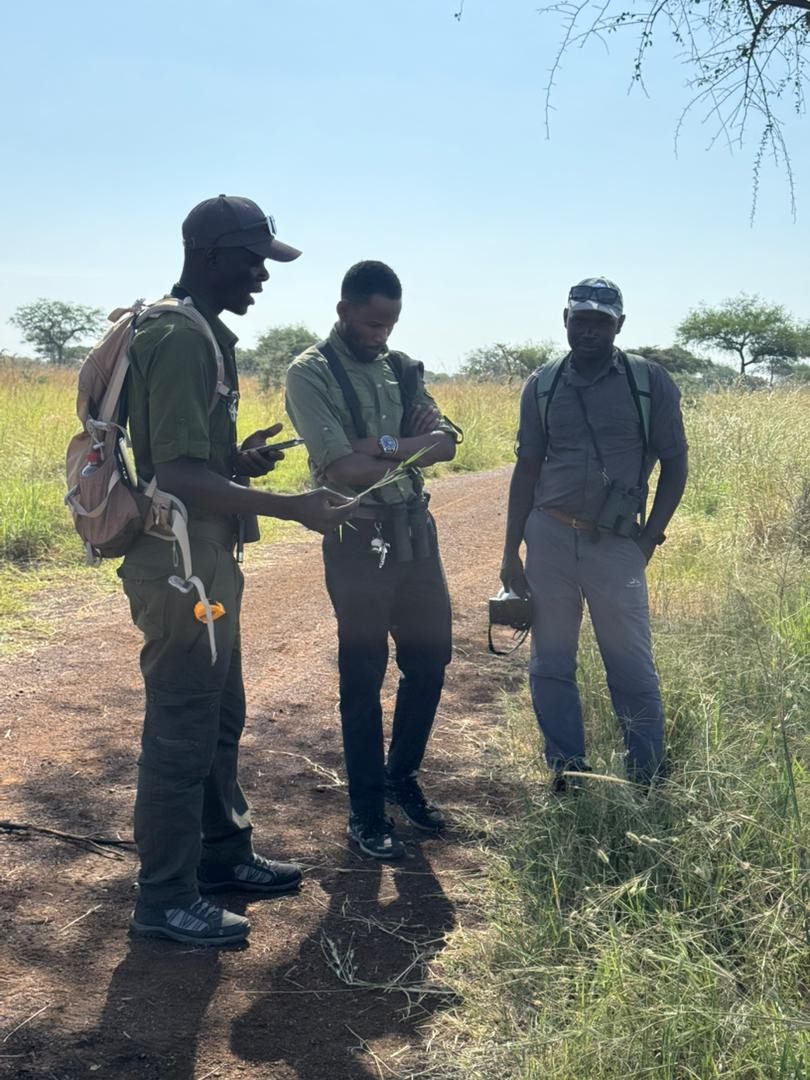 Paius briefing guests in the field