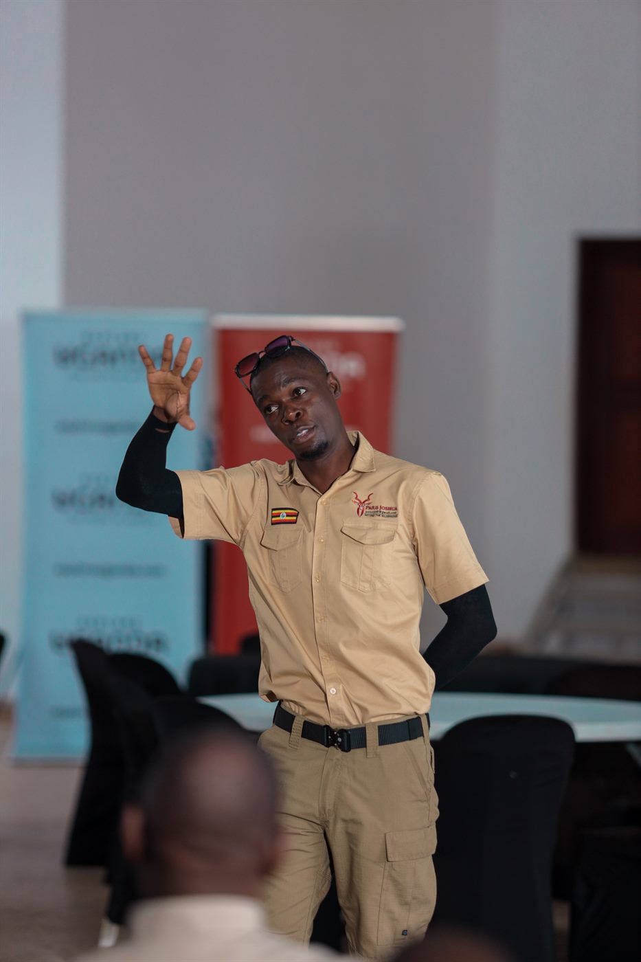Paius speaking during a guide training session
